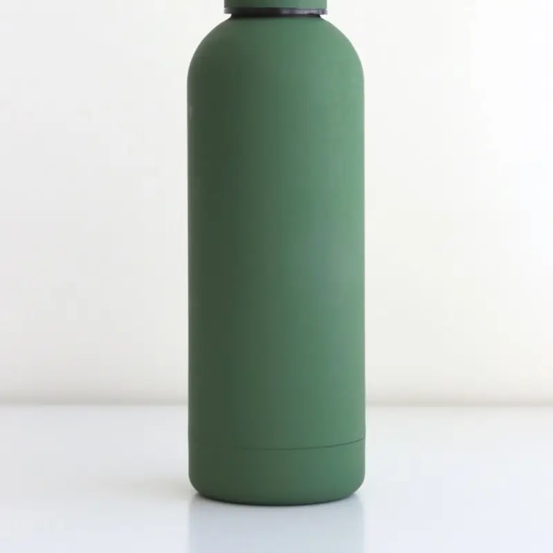 A matte green insulated drinks bottle